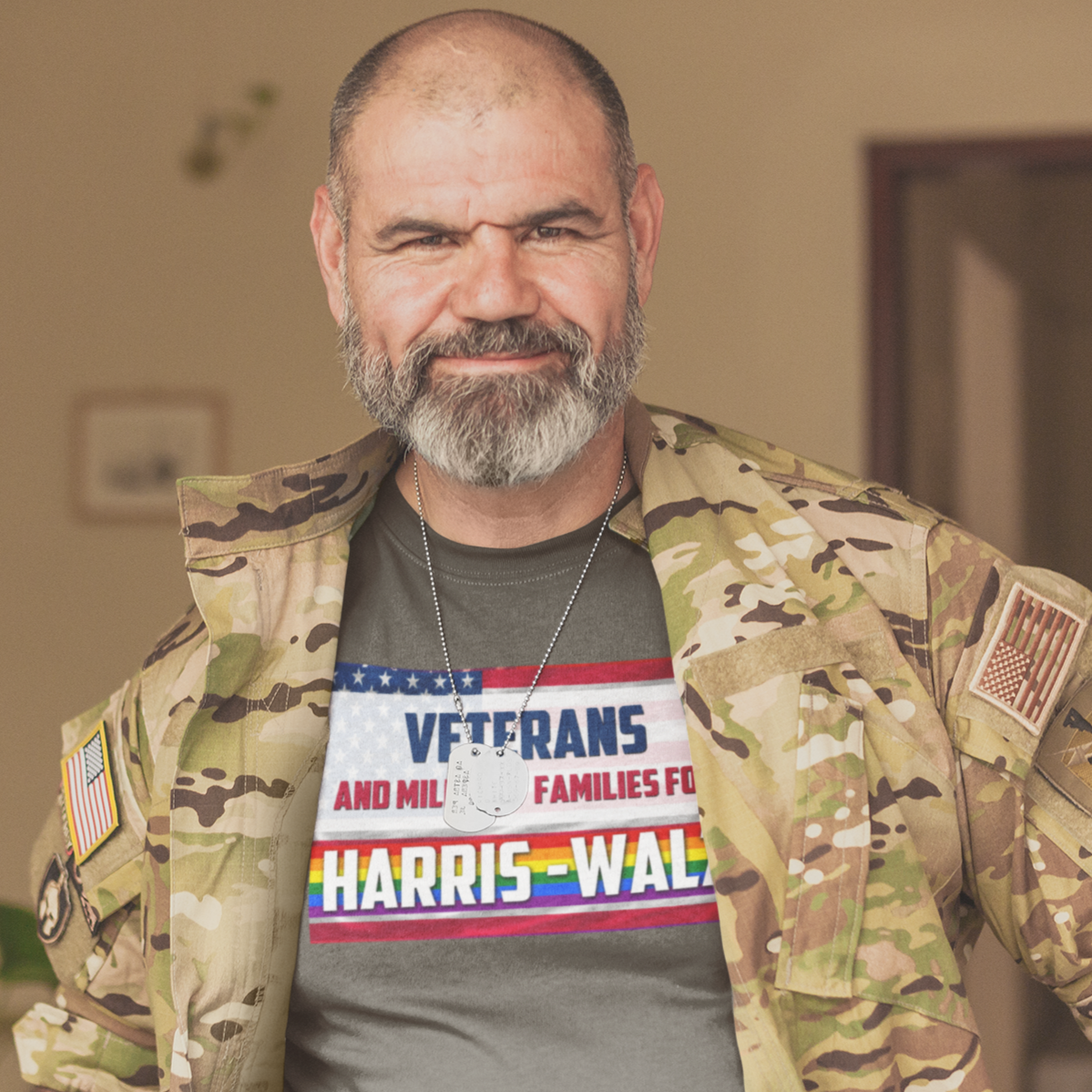 Gay Army Veteran wearing Veterans and Military Families for Harris - Walz T-Shirt